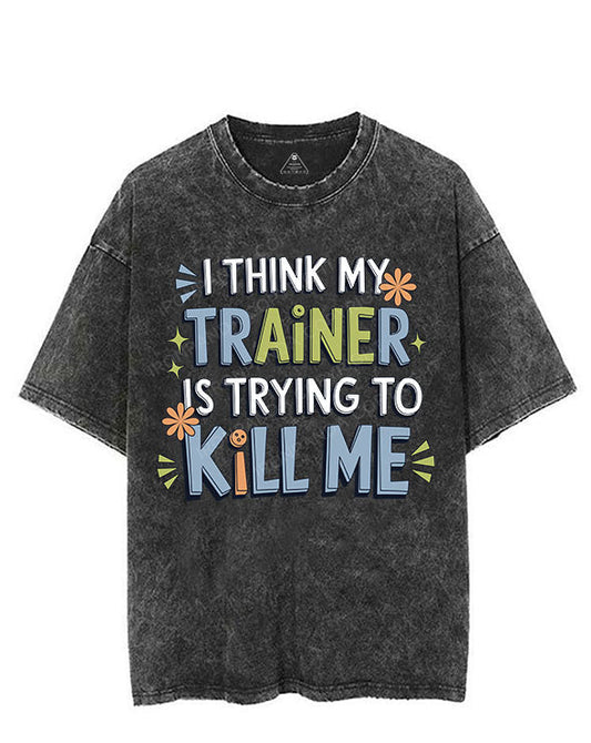 I THINK MY TRAINER IS TRYING TO KILL ME VINTAGE GYM SHIRT